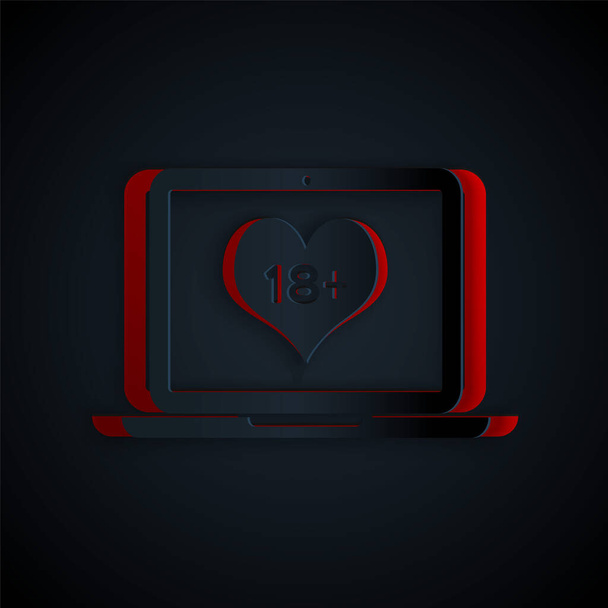 Χαρτοκόπηκα Laptop υπολογιστή με 18 συν περιεχόμενο εικονίδιο καρδιά απομονώνονται σε μαύρο φόντο. Σύμβολο περιορισμού ηλικίας. 18 συν το σήμα περιεχομένου. Κανάλι ενηλίκων. Στυλ χάρτινης τέχνης. Εικονογράφηση διανύσματος - Διάνυσμα, εικόνα