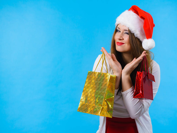 Happy Christmas woman holds gifts bag - Zdjęcie, obraz