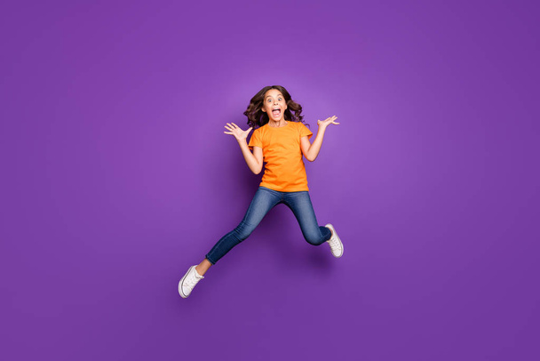 Full length body size view of her she nice attractive lovely pretty crazy overjoyed cheerful cheery wavy-haired girl jumping having fun fooling isolated on lilac purple violet pastel color background - Photo, Image