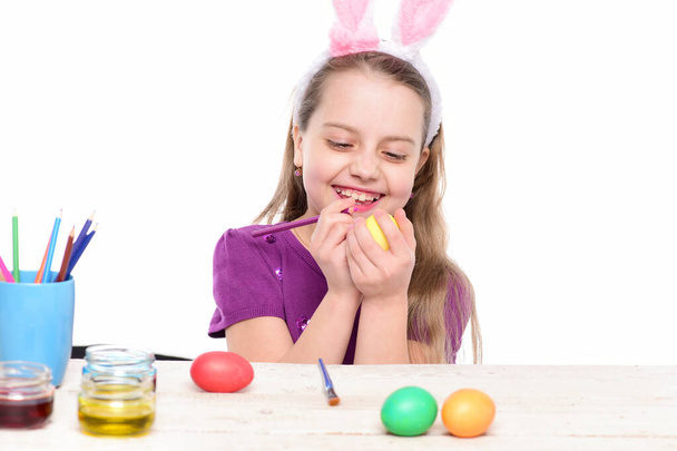 small happy baby girl with easter eggs isolated on white - Foto, Imagen