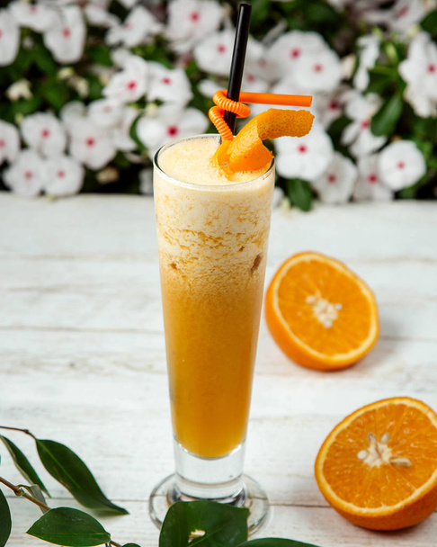 orange juice with crushed ice - 写真・画像
