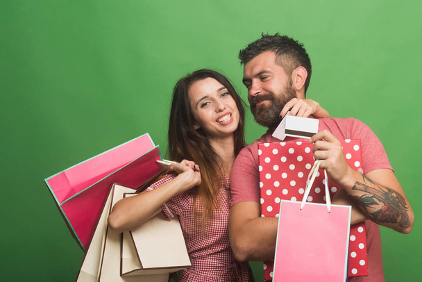 Guy with beard and pretty lady with do shopping - Foto, Imagem