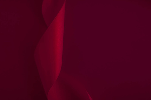 Cinta de seda rizada abstracta sobre fondo de vino, lujo exclusivo
  - Foto, imagen