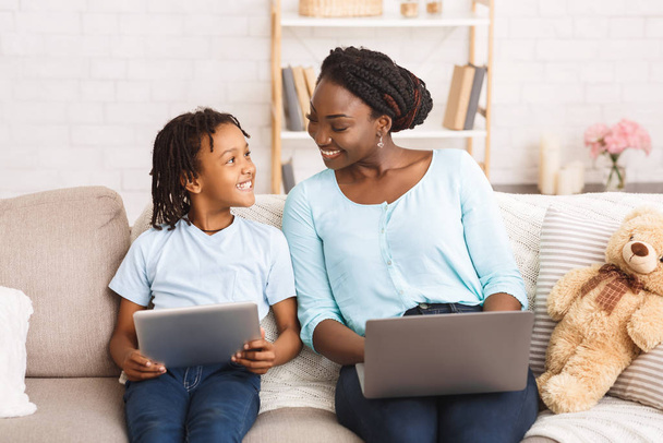 Black mom and daughter planning their dream trip - Photo, Image