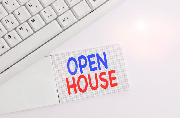Handwriting text writing Open House. Concept meaning a place or situation in which all visitors are welcome to go in White pc keyboard with empty note paper above white background. - Photo, Image