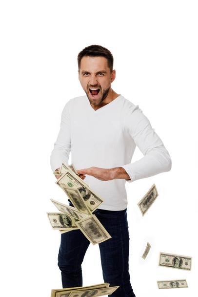 Чоловік викидає гроші банкноти
 - Фото, зображення