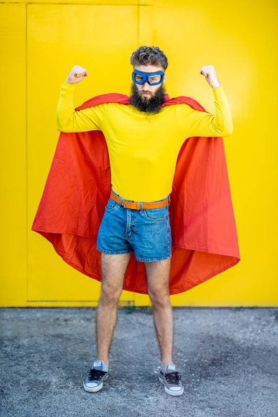 Superman portrait on the yellow background - Photo, Image