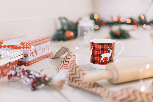 Deer mug on decorated kitchen bar for Christmas - Φωτογραφία, εικόνα