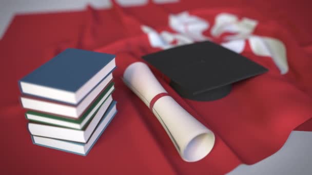Tapa de graduación, libros y diploma en la bandera. La educación superior en Hong Kong relacionados con la animación 3D conceptual
 - Imágenes, Vídeo