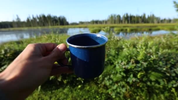 Coffee cup in natural landscape - Footage, Video