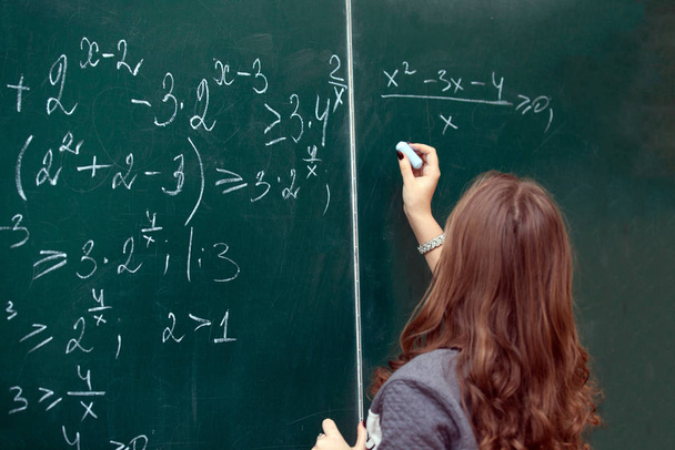 close up of math formulas on a blackboard - Photo, Image