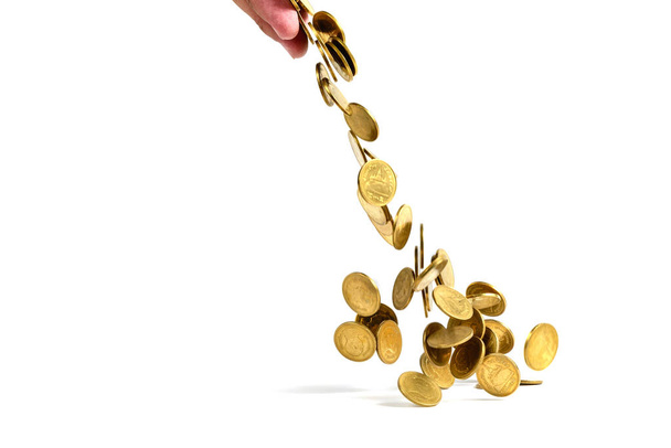 Falling gold coins money isolated on the white background, busin - 写真・画像