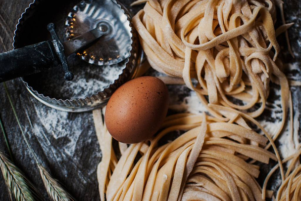 A high angle closeup shot the ingredients for pasta preparation - Zdjęcie, obraz