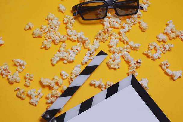 Cinema session, film, movie clapperboard, popcorn, 3D glasses. V - Photo, Image