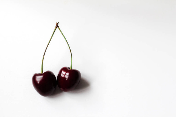 cherries on a white background. - Zdjęcie, obraz