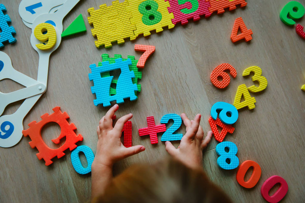 little girl learning numbers and math, education concept - Fotografie, Obrázek