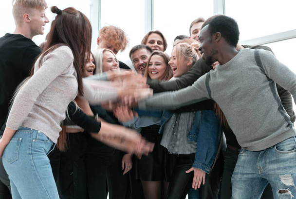 group of happy young people showing their unity - Фото, изображение