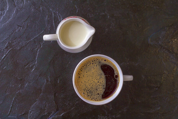 cup with hot coffee and milk - 写真・画像