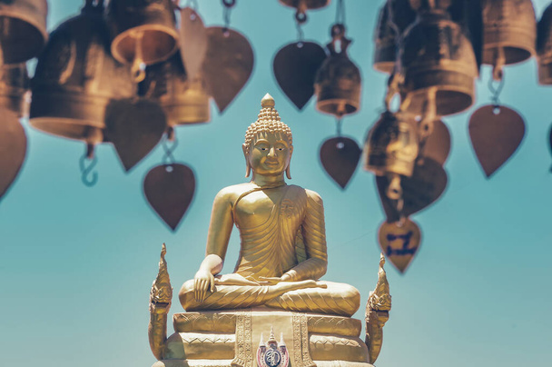 Golden Buddha next to the Big Buddha in Phuket, Thailand. Toned image with a vintage effect look. - Zdjęcie, obraz