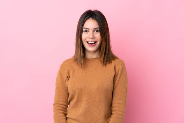 Young woman over isolated pink background with surprise facial expression - Photo, Image