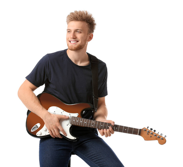 Handsome man with guitar on white background - Foto, afbeelding