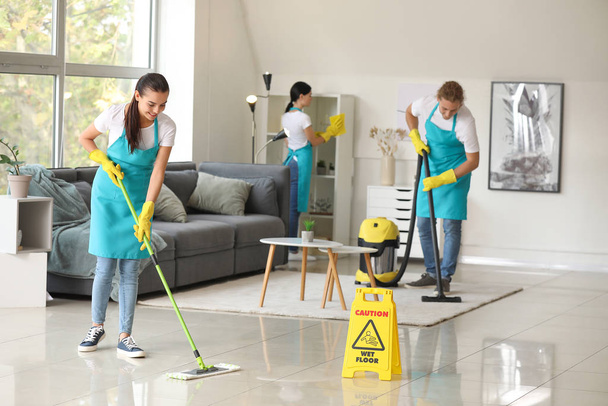 Team of janitors cleaning flat - Photo, Image
