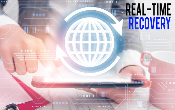 Writing note showing Real Time Recovery. Business photo showcasing maximum time period in which recent data can recover. - Photo, Image