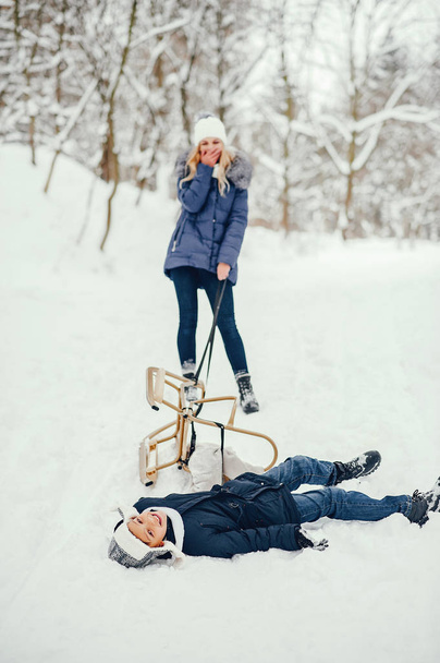 Mother with cute son in a winter oark - Foto, immagini