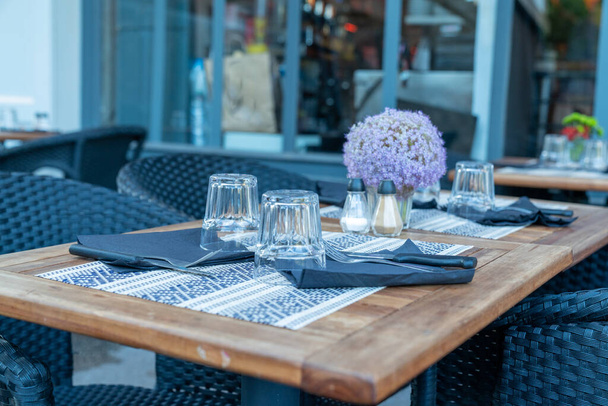 outdoor restaurant table set up simple summer elegant - Fotoğraf, Görsel