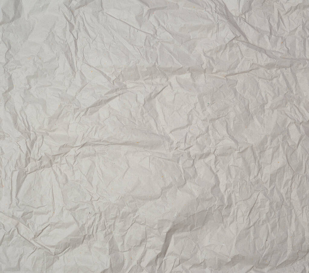 empty gray crumpled sheet of paper, full frame - Photo, Image