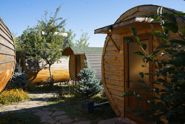 hotel rooms in the form of wooden round barrels - Photo, Image