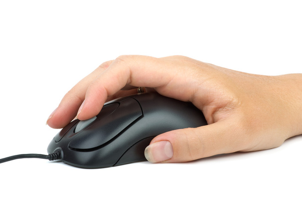 Комп'ютерна миша в руці
. - Фото, зображення