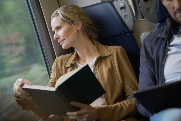 couple traveling in a train - Photo, Image