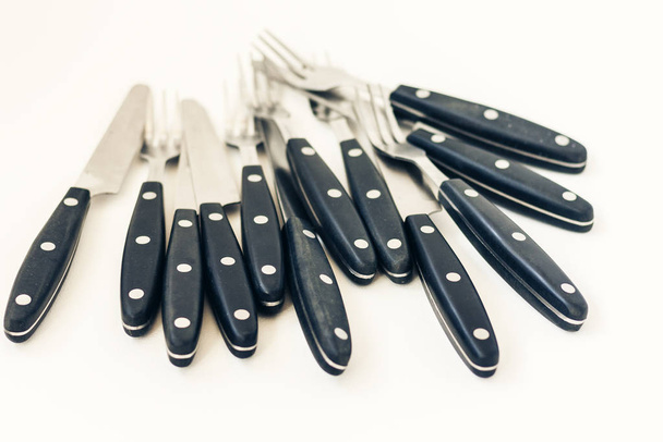 Close up six knives and forks isolated on white background. - Photo, Image