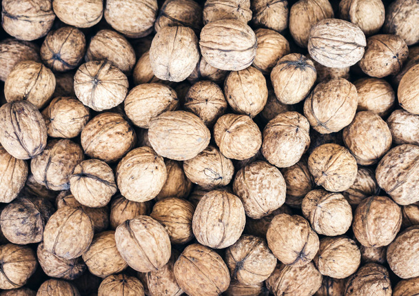 Natural walnut in shell background pattern texture. - Zdjęcie, obraz