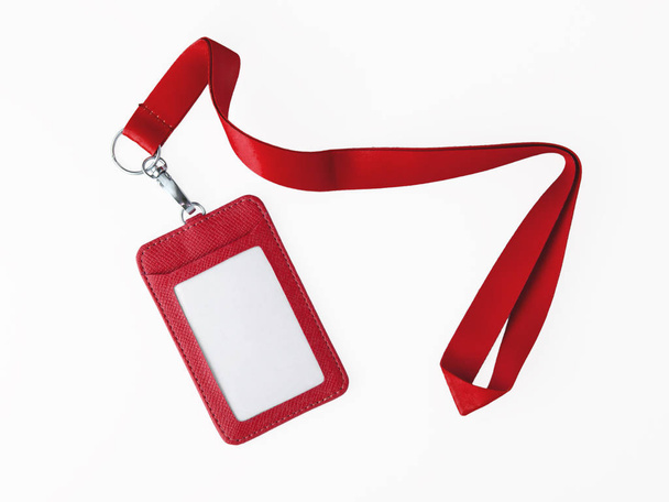 Red lanyard and leather badge isolated on white  - Photo, Image