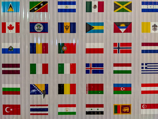 Sok világ zászlók nyomtatott egy lemez blokk, nemzetközi béke - Fotó, kép