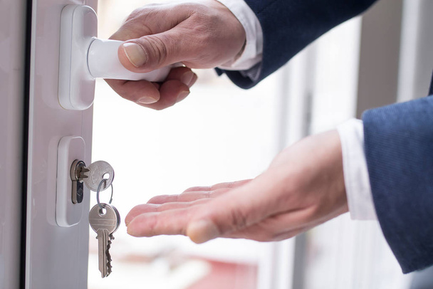 handing over the keys to the new house, real estate concept - 写真・画像