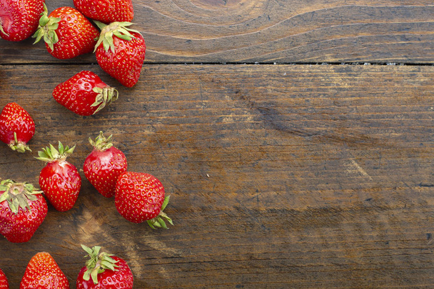 fresh strawberries on wooden background - Zdjęcie, obraz