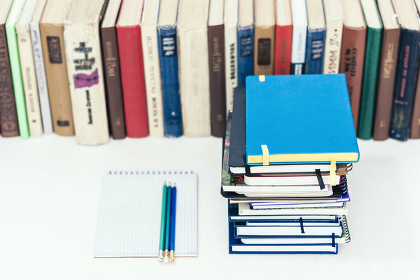 Notebooks piles, stack of books education back to school backgro - 写真・画像