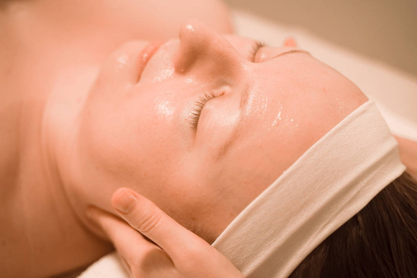 face massage step by step in spa salon close up - Φωτογραφία, εικόνα