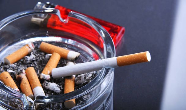 Ashtray and cigarettes. Tobacco smoking. - Photo, Image