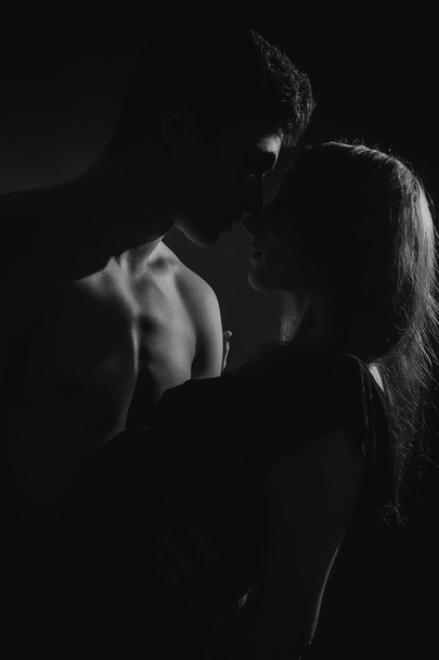 Passionate embraces men and women - Zdjęcie, obraz