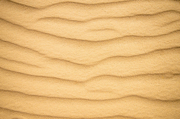 Padrão de duna de areia de verão para fundo. Close-up de padrões em uma duna de areia com ondulações, textura de areia
 - Foto, Imagem