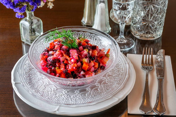 The vinaigrette of some fresh boiled vegetables in the glass dis - Valokuva, kuva