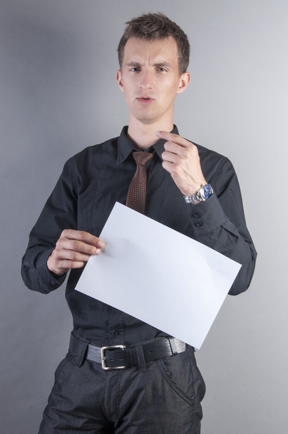 young handsome businessman with blank card - Foto, afbeelding