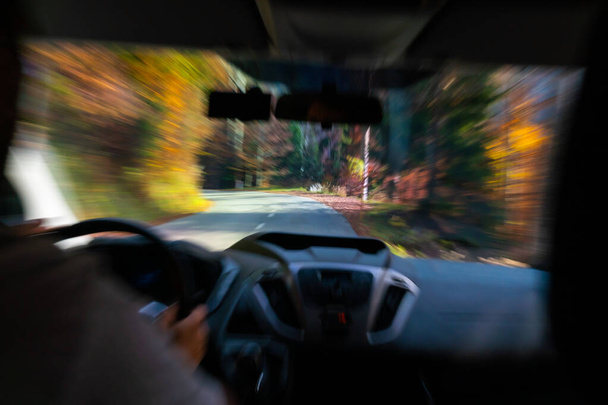 Zoom burst effect while driving down a mountain road - Photo, Image