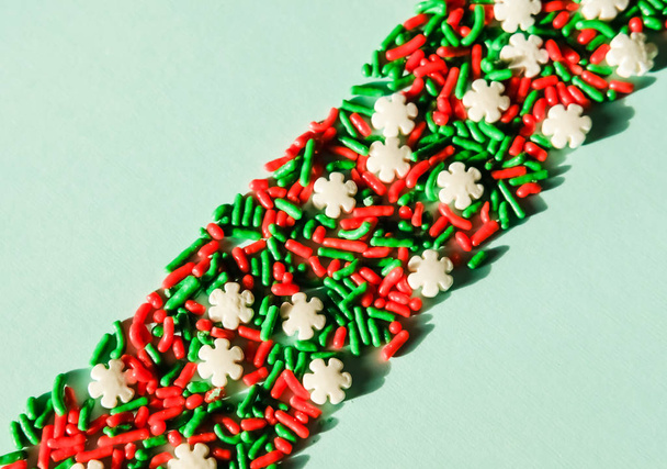 Christmas sugar sprinkles background. - Foto, Imagen