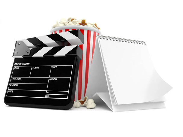 Popcorn and clapboard with blank calendar - Foto, afbeelding