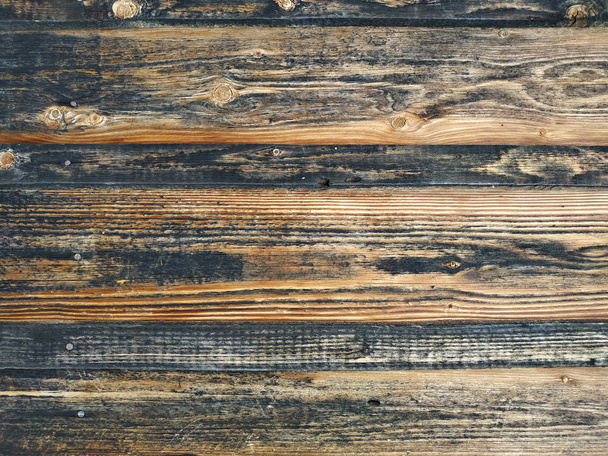 Wooden background texture painted aged surface peeled off spoiled texture swirls cracks defects flaws holes nails vertical horizontal - Fotografie, Obrázek